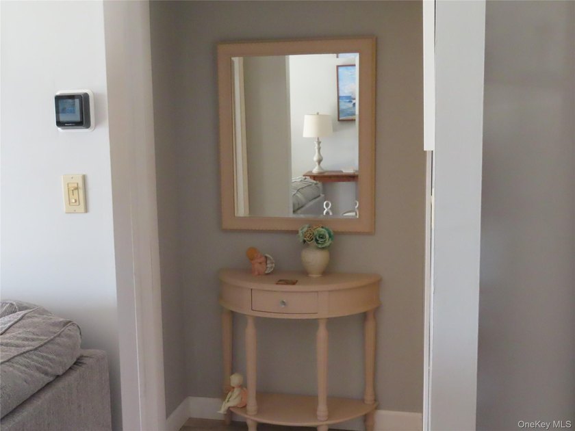 Perched in a prime upper-unit location with break taking views - photo 17
