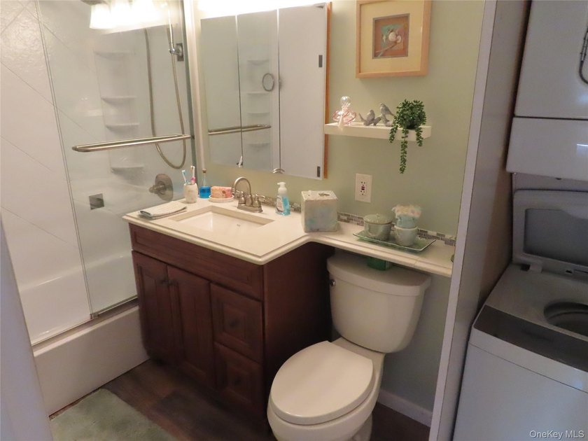 Perched in a prime upper-unit location with break taking views - photo 18