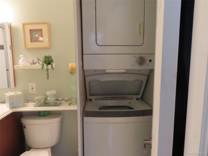 Perched in a prime upper-unit location with break taking views - photo 21