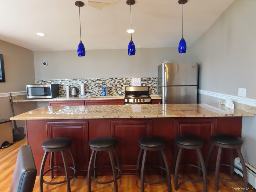 Perched in a prime upper-unit location with break taking views - photo 41