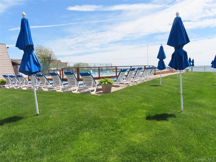 Perched in a prime upper-unit location with break taking views - photo 43