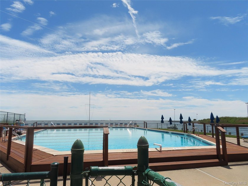 Perched in a prime upper-unit location with break taking views - photo 44