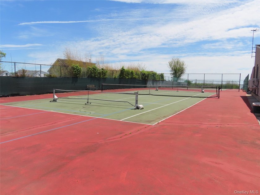 Perched in a prime upper-unit location with break taking views - photo 45