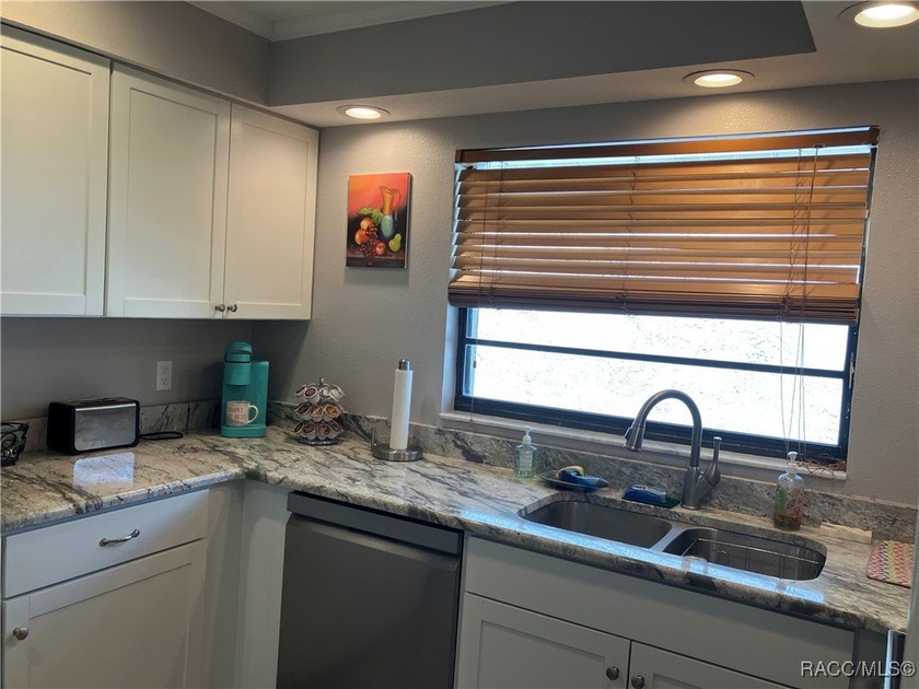 $7,500 NEW PRICE REDUCTION! Beautiful VILLA on the CANAL with - photo 8