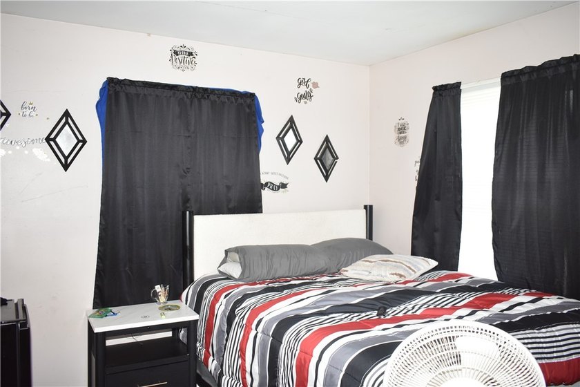 This spacious 4-bedroom home. Large front porch. You also have a - photo 12