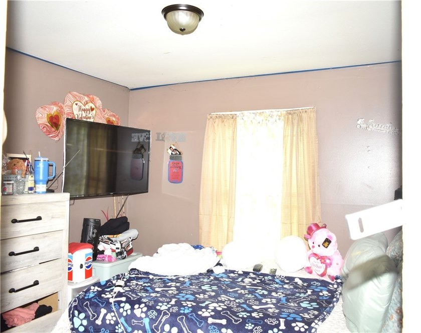 This spacious 4-bedroom home. Large front porch. You also have a - photo 13