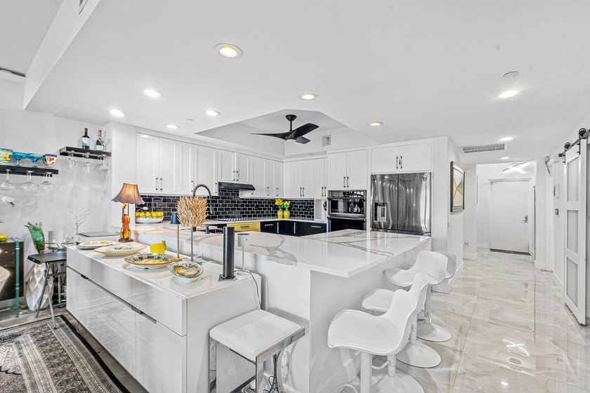 Beautifully upgraded 2 BR + den, 2 remodeled BA overlooking the - photo 6