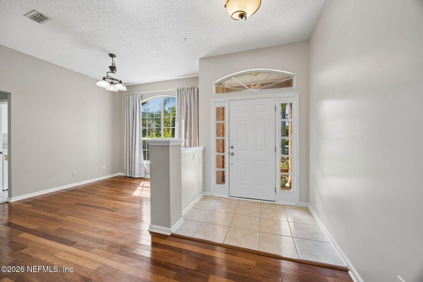 Welcome to this stunning lakefront retreat in the highly - photo 3
