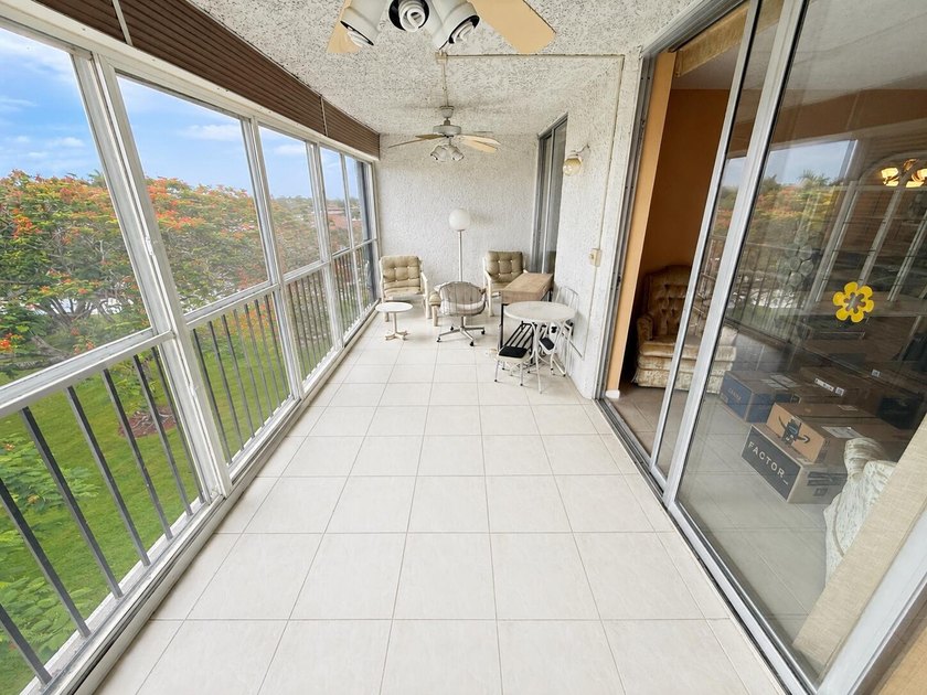 Enjoy penthouse living in the desirable gated section of - photo 3