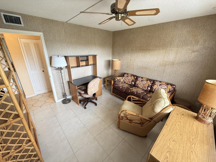 Enjoy penthouse living in the desirable gated section of - photo 5