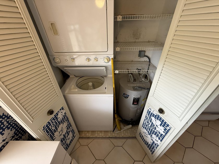 Enjoy penthouse living in the desirable gated section of - photo 7