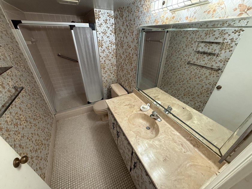 Enjoy penthouse living in the desirable gated section of - photo 8