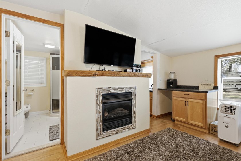 Escape to the lake without the waterfront price! This charming - photo 11