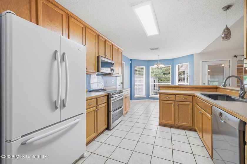 Welcome to 98175 Golf Club Drive, a well-maintained 4-bedroom - photo 11