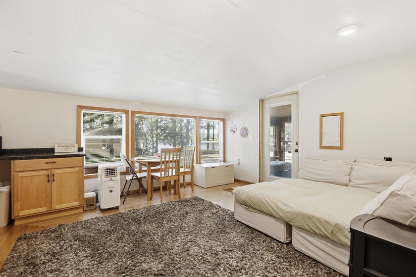 Escape to the lake without the waterfront price! This charming - photo 12