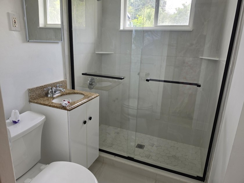 Welcome to this beautifully renovated 3-bedroom, 1-bath home - photo 2