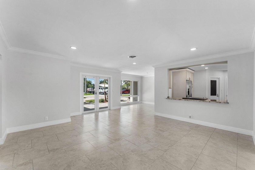 Experience luxury waterfront living in the prestigious Cove of - photo 6