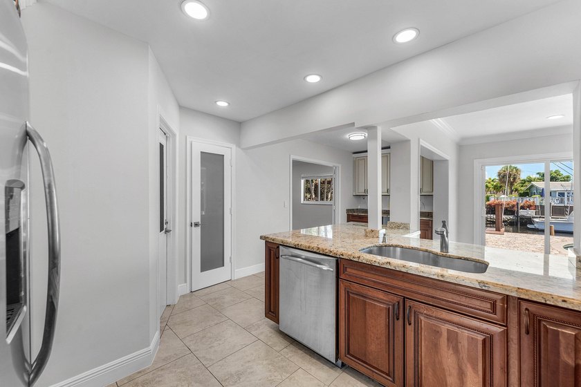 Experience luxury waterfront living in the prestigious Cove of - photo 8