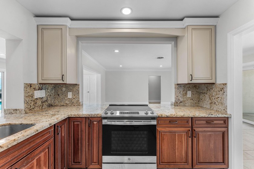 Experience luxury waterfront living in the prestigious Cove of - photo 10