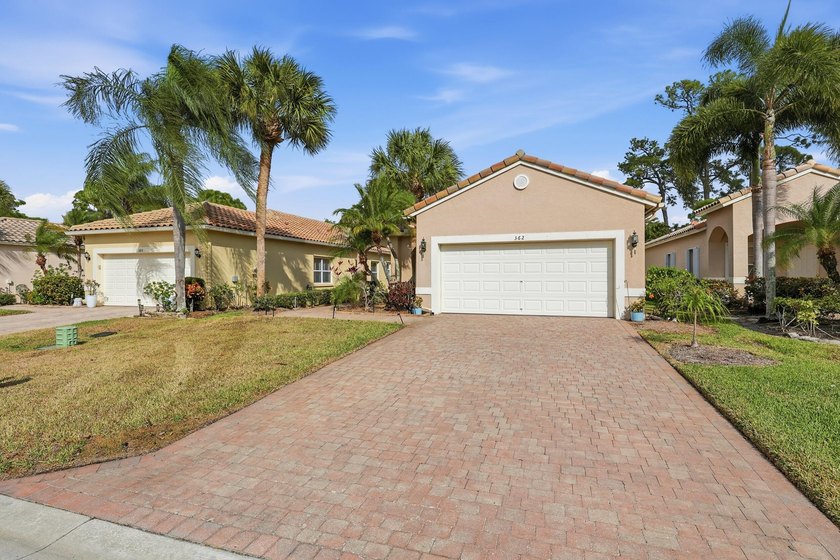 Beautifully updated and backing to a peaceful preserve, this - photo 2