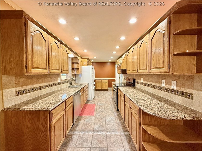 This well-maintained brick ranch-style home offers three - photo 12