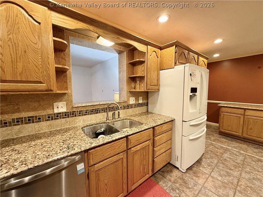 This well-maintained brick ranch-style home offers three - photo 13