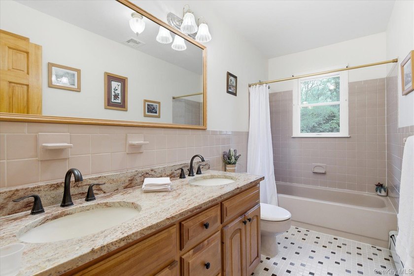 Feel the warmth of this home the moment you walk through the - photo 13