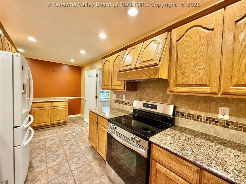 This well-maintained brick ranch-style home offers three - photo 14