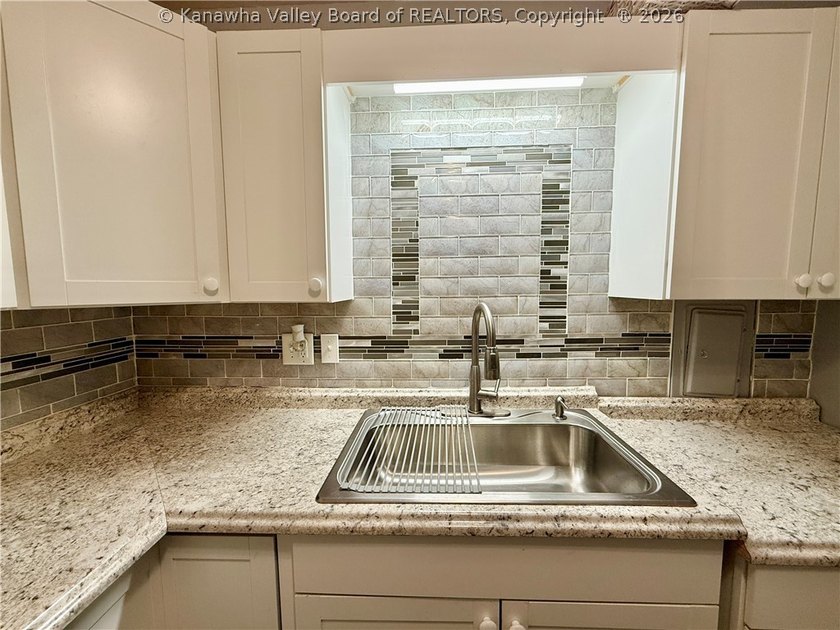 This well-maintained brick ranch-style home offers three - photo 19