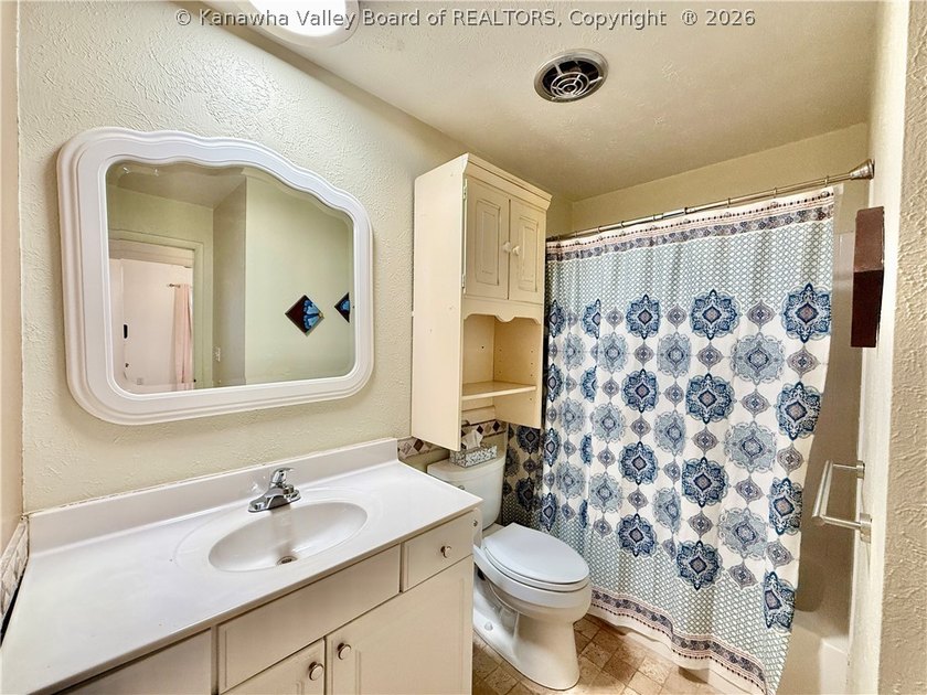 This well-maintained brick ranch-style home offers three - photo 29