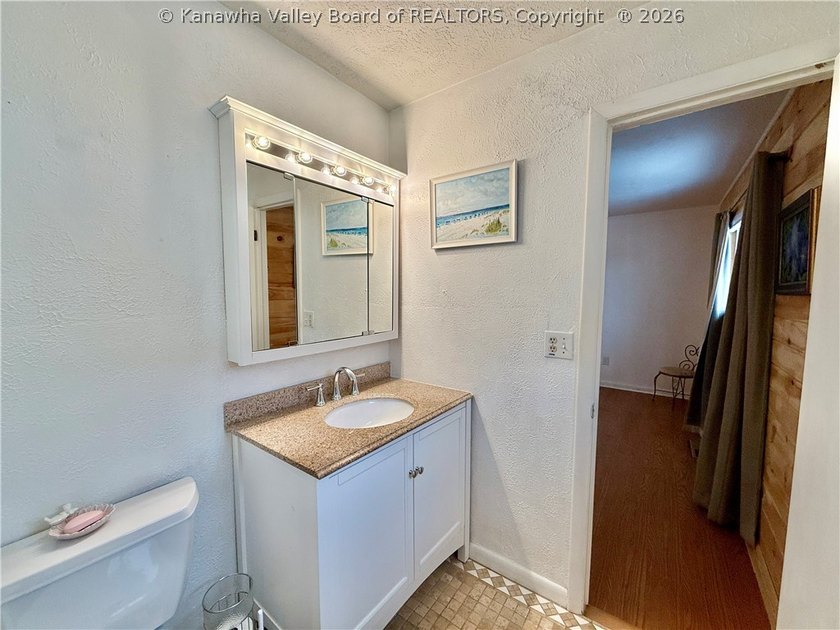 This well-maintained brick ranch-style home offers three - photo 37