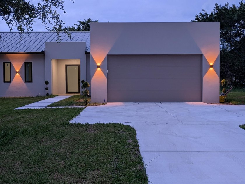Welcome to this 2026 modern residence, nestled on a private - photo 2