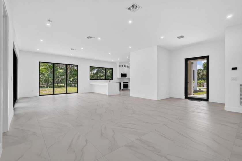 Welcome to this 2026 modern residence, nestled on a private - photo 9