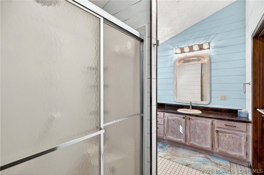 176 Kansas City Way in Sunrise Beach, MO 65079 offers a true - photo 27