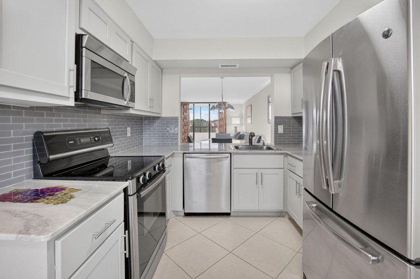 Welcome to this waterfront totally updated Penthouse condominium - photo 5