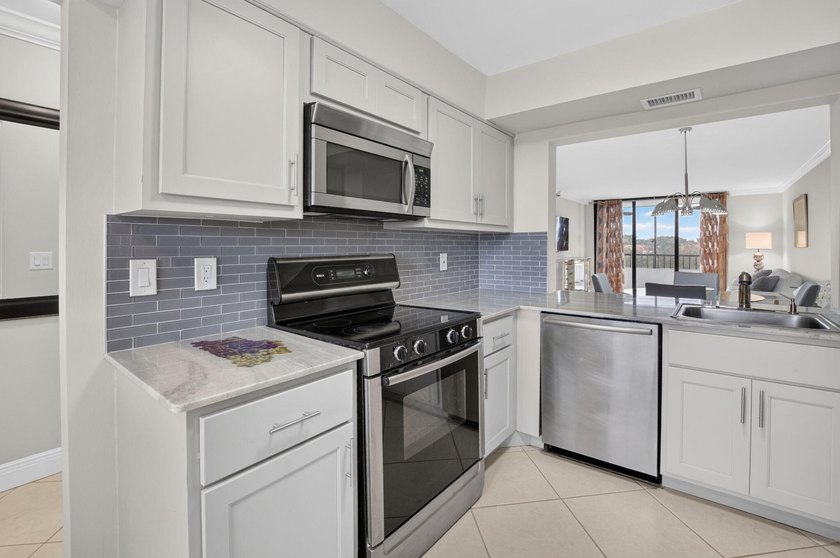 Welcome to this waterfront totally updated Penthouse condominium - photo 7