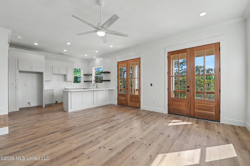 Enjoy coastal living on the beautiful Biloxi Back Bay in this - photo 5