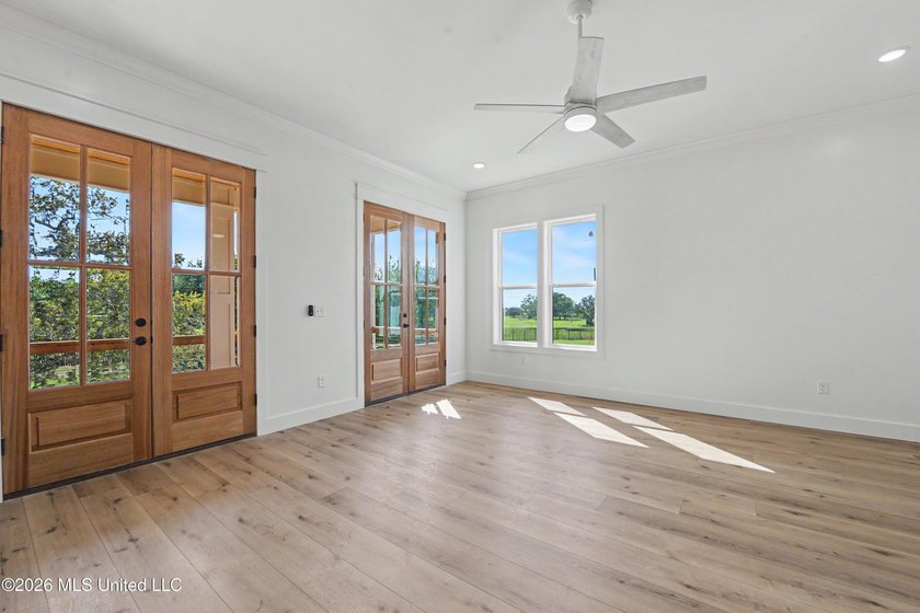 Enjoy coastal living on the beautiful Biloxi Back Bay in this - photo 6