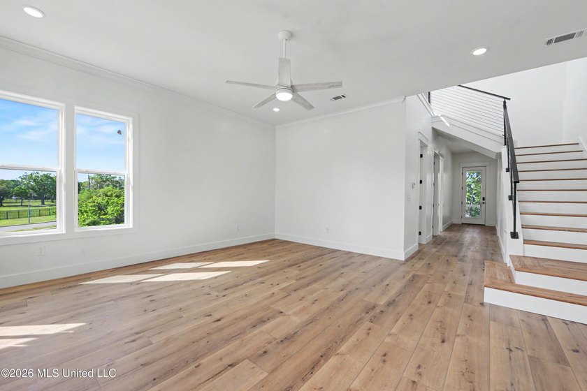 Enjoy coastal living on the beautiful Biloxi Back Bay in this - photo 7