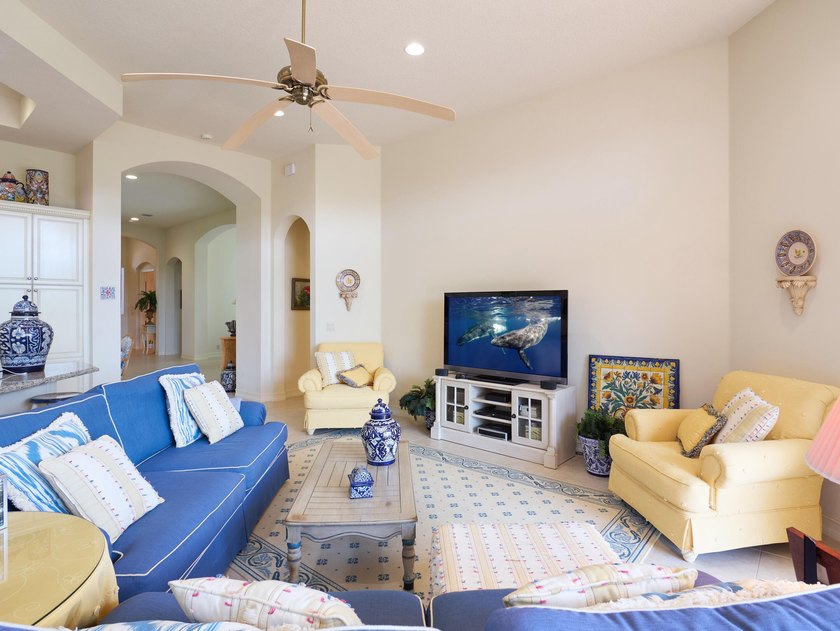 Bright and spacious, this well-maintained home offers soaring - photo 9