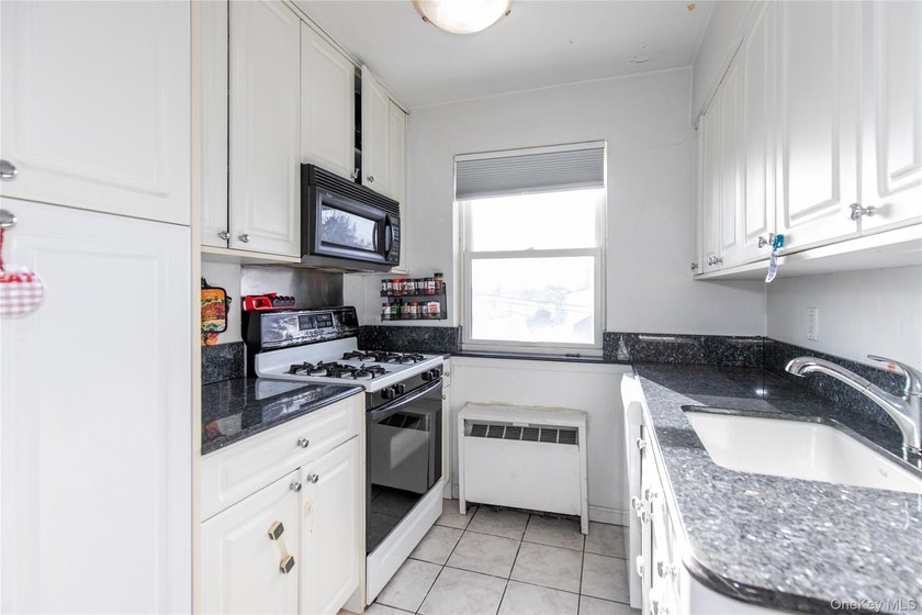 Spacious, Impeccably Maintained 2-Bedroom, 1-Bath Co-Op Unit In - photo 11