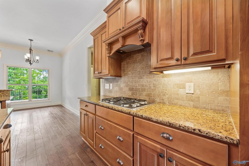 Lake-view ranch featuring 4 bedrooms, 4 full baths, a spacious - photo 15
