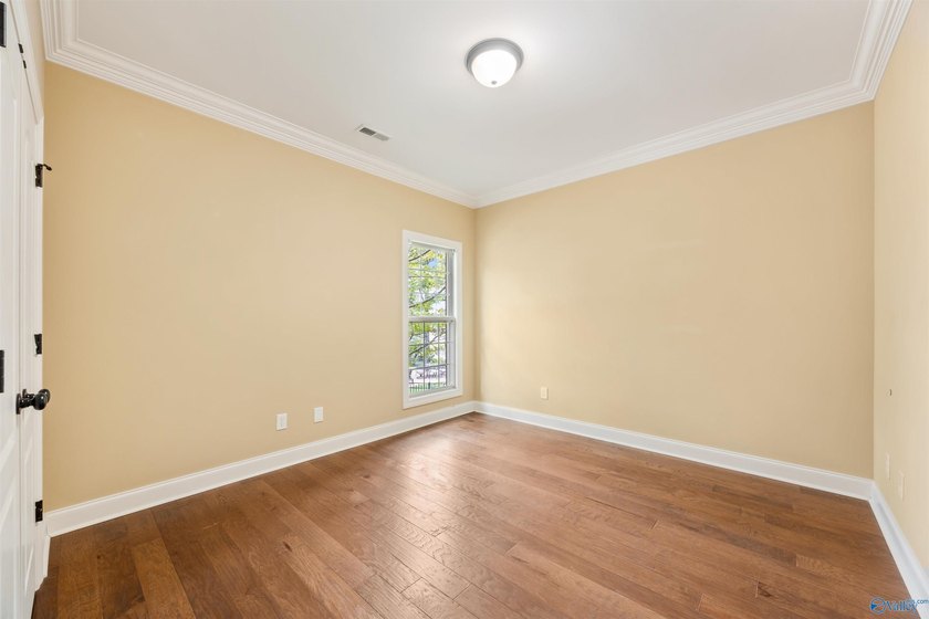 Lake-view ranch featuring 4 bedrooms, 4 full baths, a spacious - photo 24