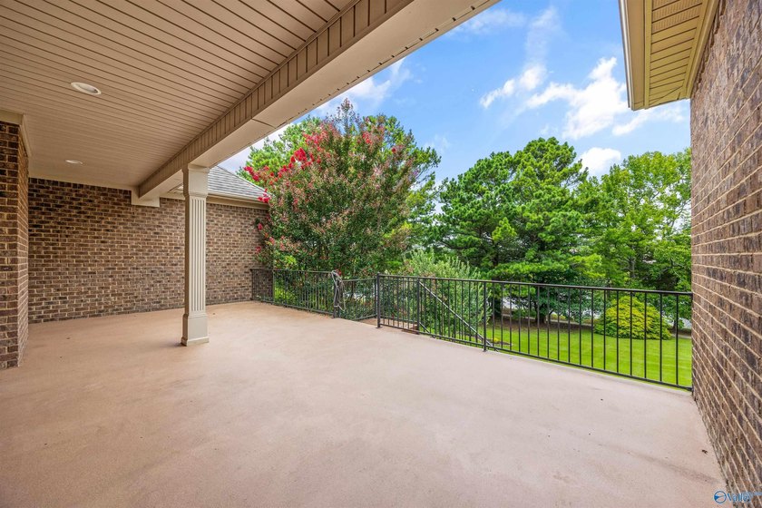 Lake-view ranch featuring 4 bedrooms, 4 full baths, a spacious - photo 29