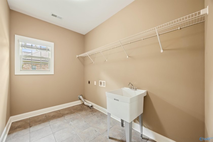 Lake-view ranch featuring 4 bedrooms, 4 full baths, a spacious - photo 31