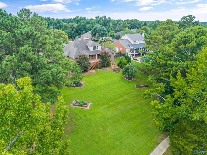 Lake-view ranch featuring 4 bedrooms, 4 full baths, a spacious - photo 32