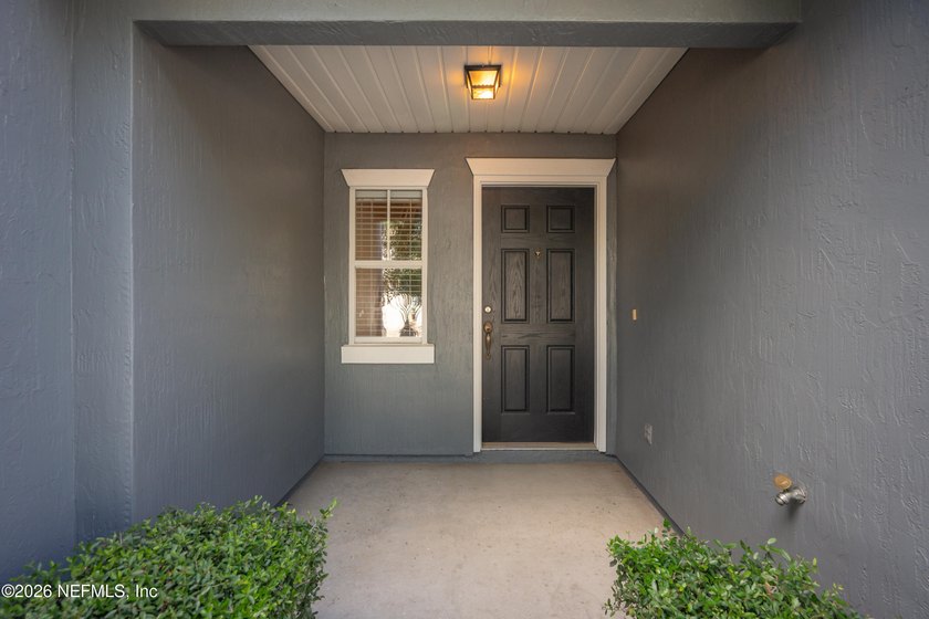 Discover low-maintenance living in this well-maintained - photo 5