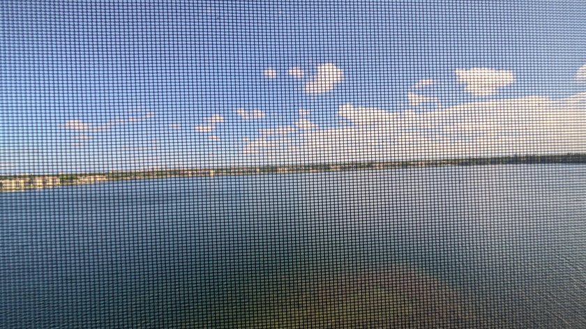 Enjoy beautiful lake views from this bright and inviting - photo 2