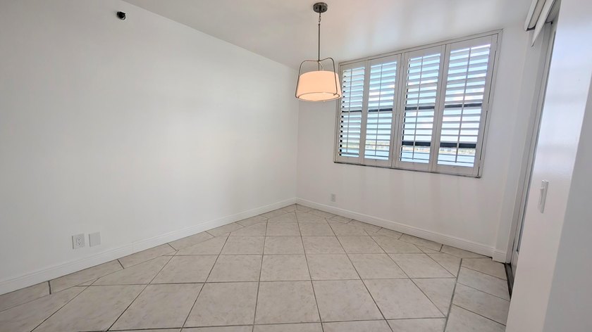 Enjoy beautiful lake views from this bright and inviting - photo 4