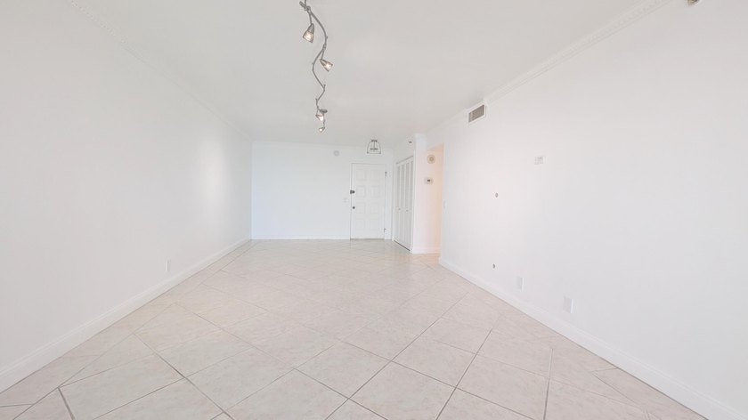 Enjoy beautiful lake views from this bright and inviting - photo 5